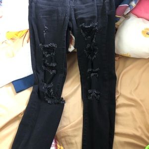 Black ripped American Eagle Jeans/Jeggings. Size 2 short
